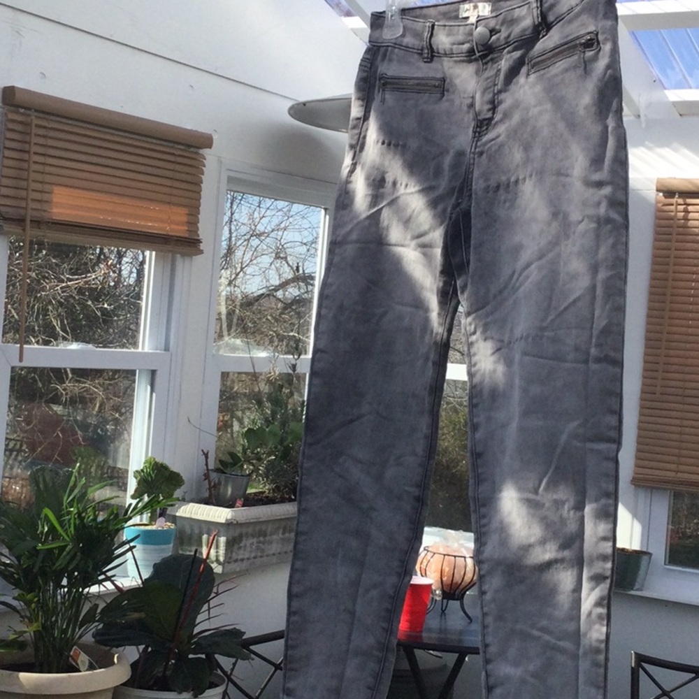 Fire distressed grey jeans.